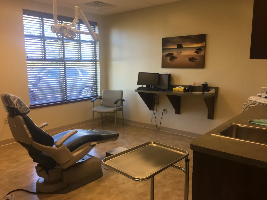 Large exam room with windows at {PRACTICE_NAME}