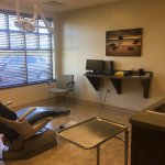 Large exam room with windows at {PRACTICE_NAME}