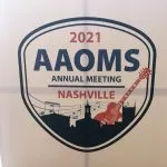 AAOMS logo from annual meeting, 2021