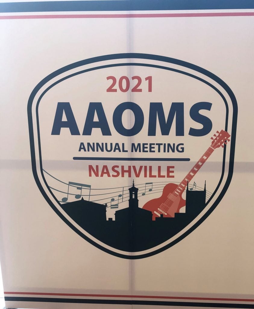 AAOMS logo from annual meeting, 2021